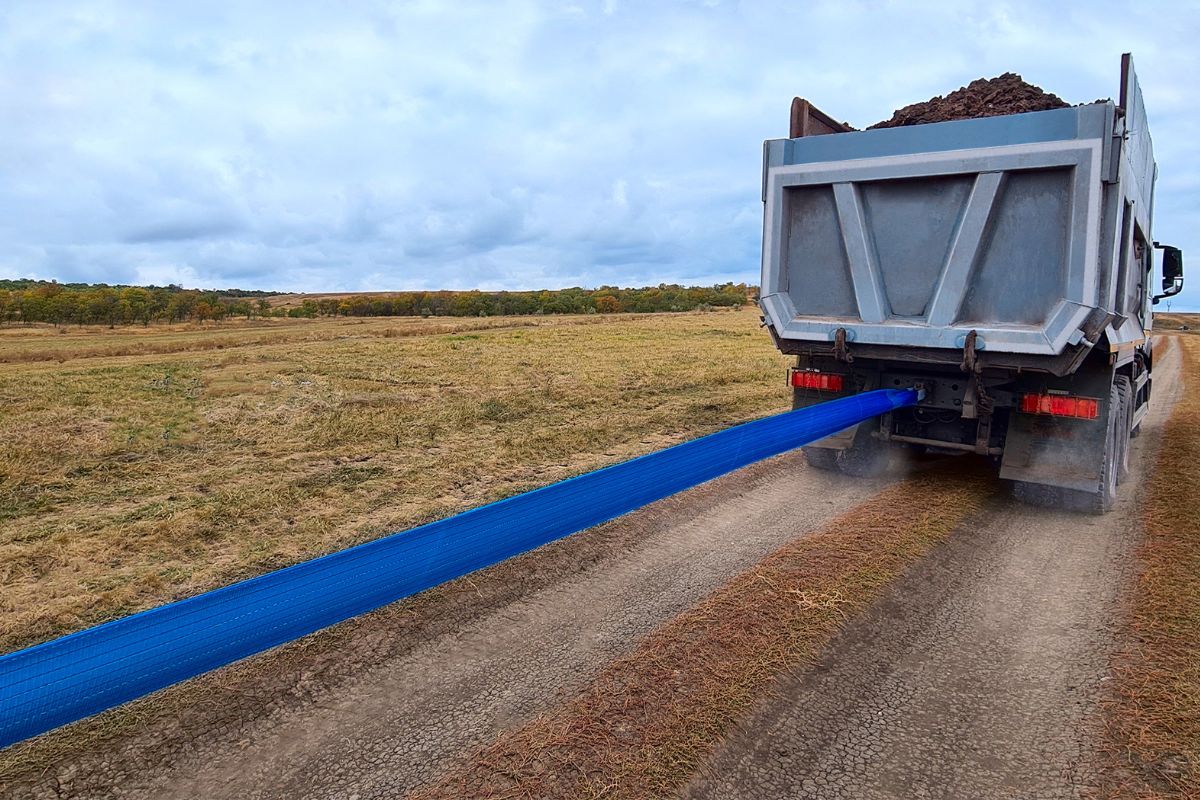 Dabwerz 140k lb towing strap used on a dump truck